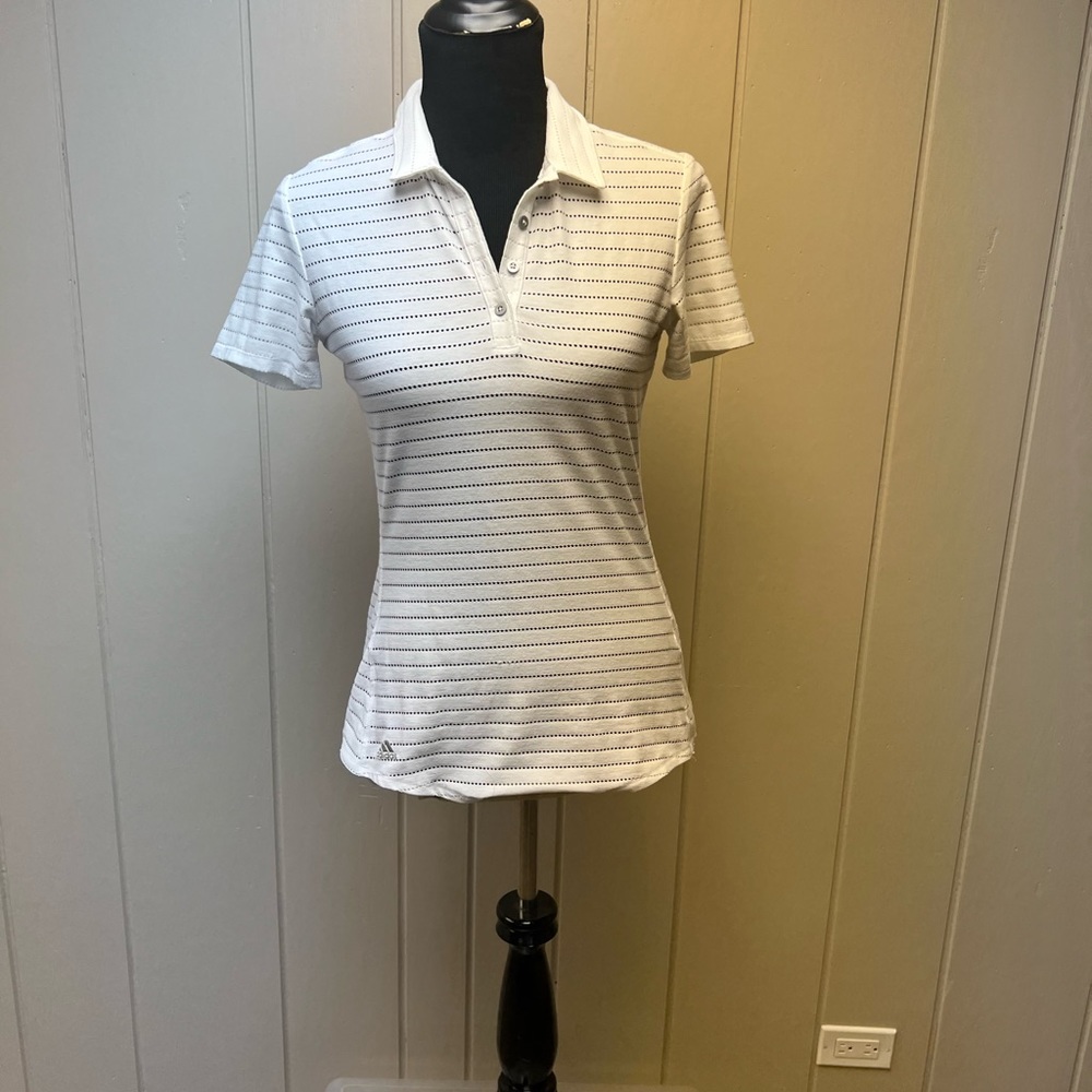 Like new condition Adidas golf shirt, vented, size extra small